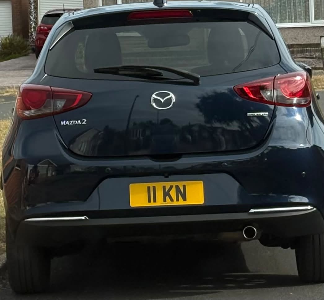 UK Number Plate 11 KN on a 2021 Blue Mazda Focus