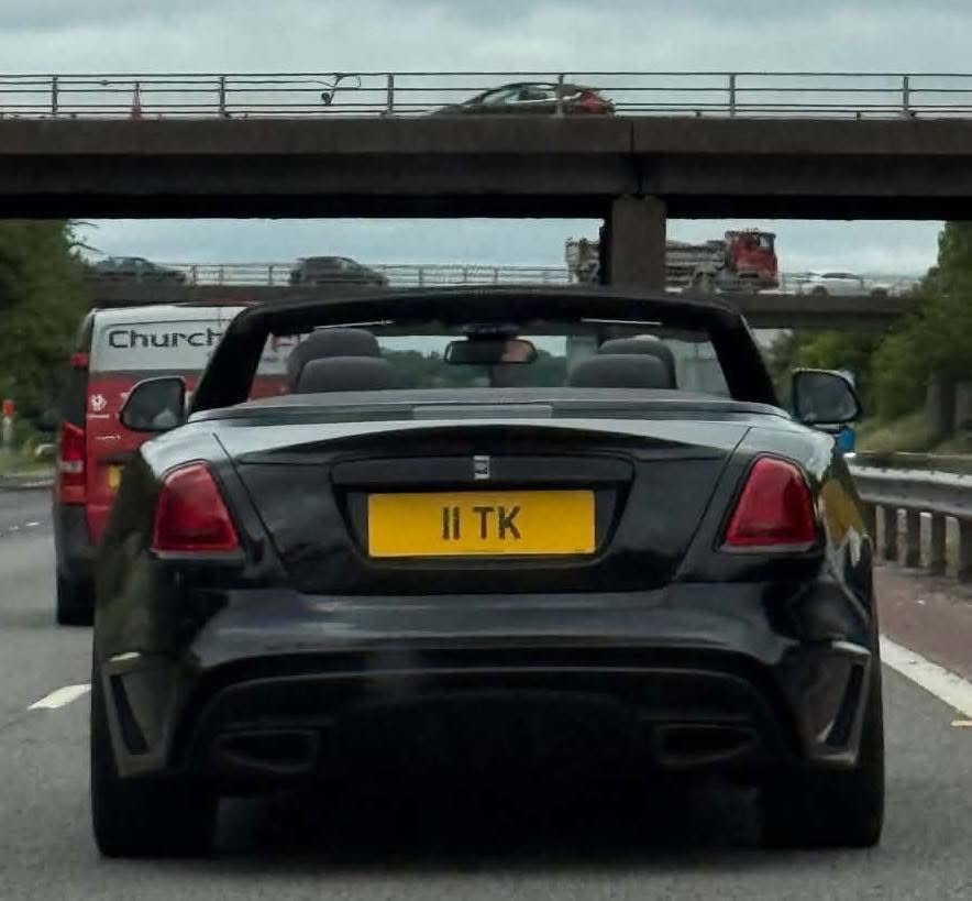 UK Number Plate 11 TK on a 2019 Black Rolls Royce Dawn V12 Black Badge Auto