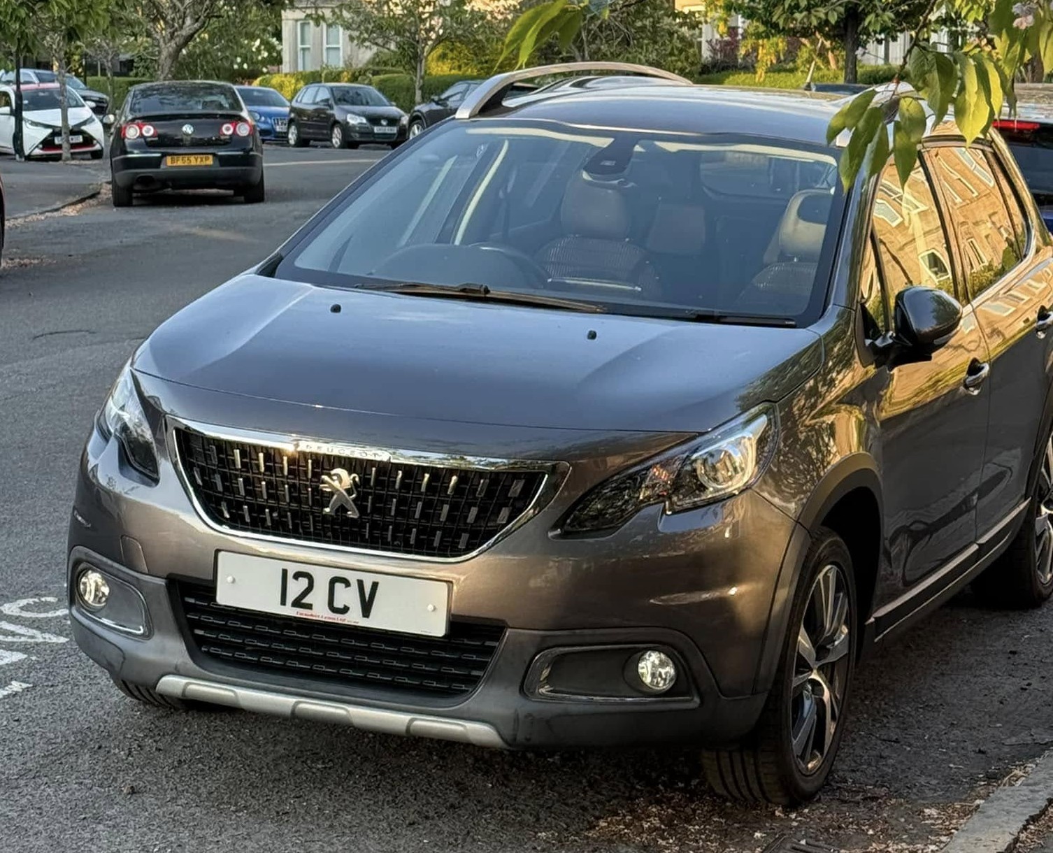 UK Number Plate 12 CV on a 2017 Grey Peugeot 2008