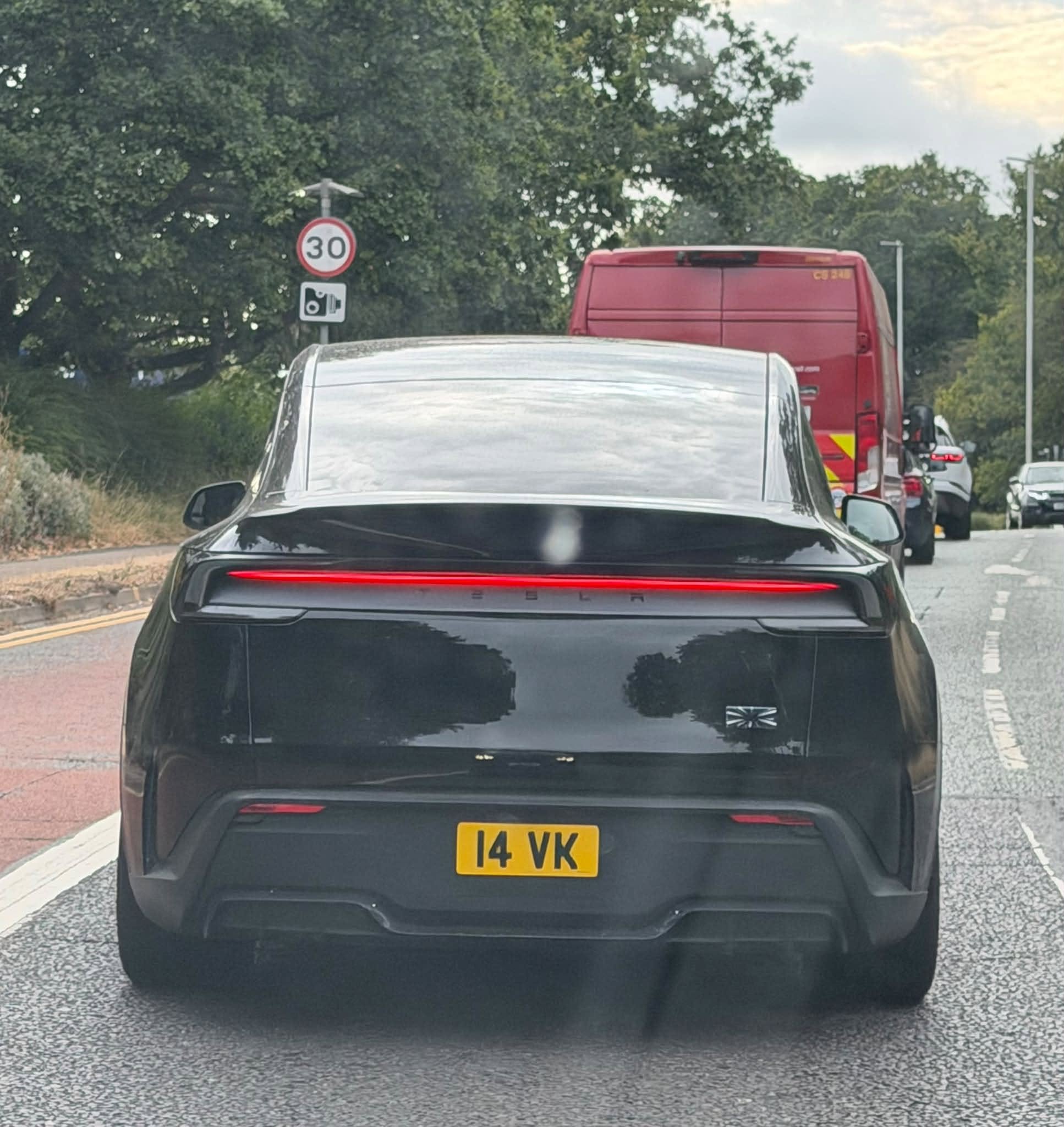 UK Number Plate 14 VK on a 2026 Black Tesla Model Y Performance Awd