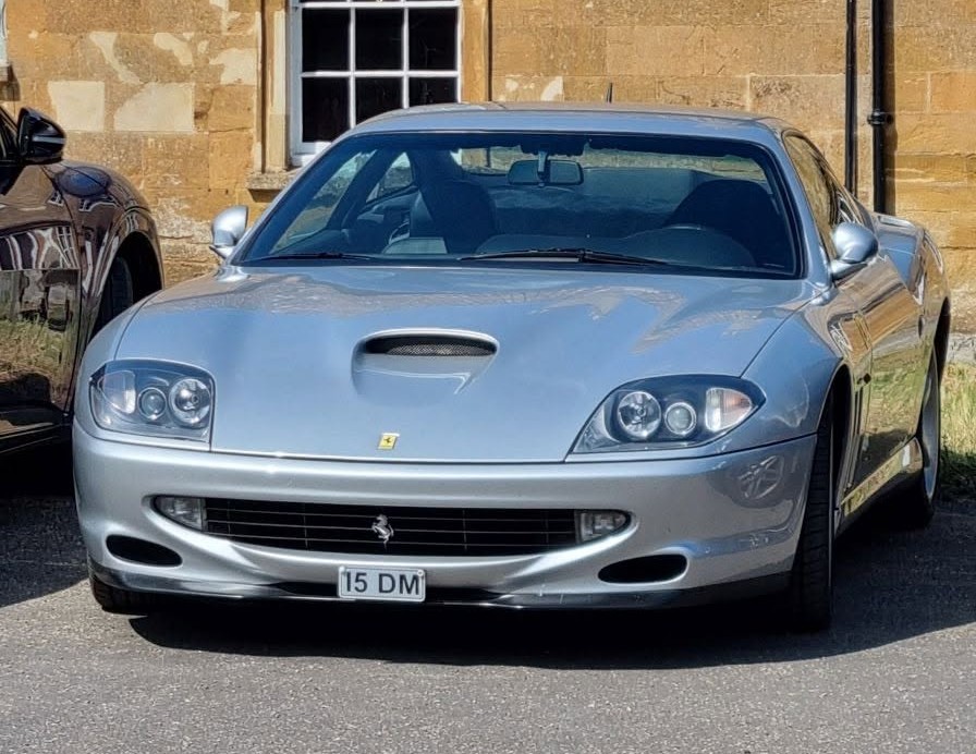 UK Number Plate 15 DM on a 1996 Silver Ferrari 550
