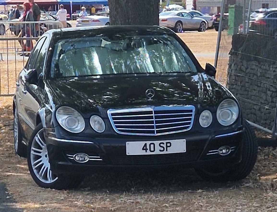 UK Number Plate 40 SP on a 2007 Black Mercedes E