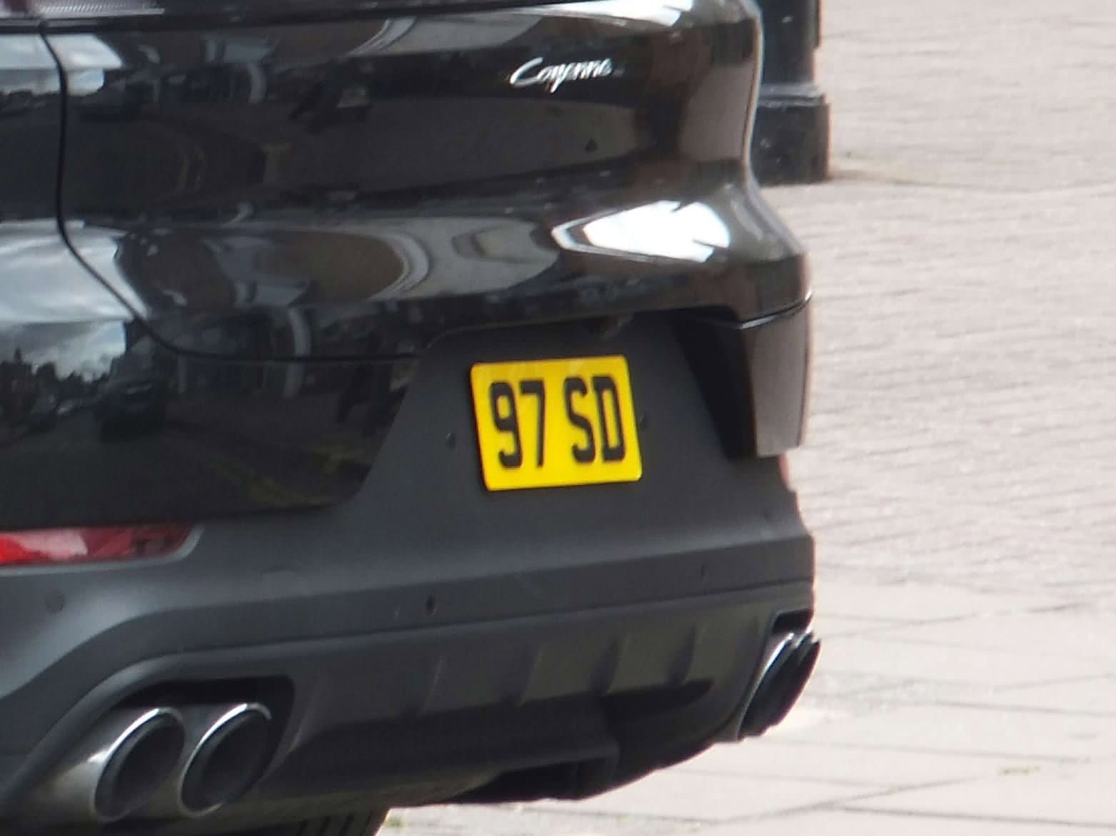 UK Number Plate 97 SD on a 2023 Black Porsche Cayenne