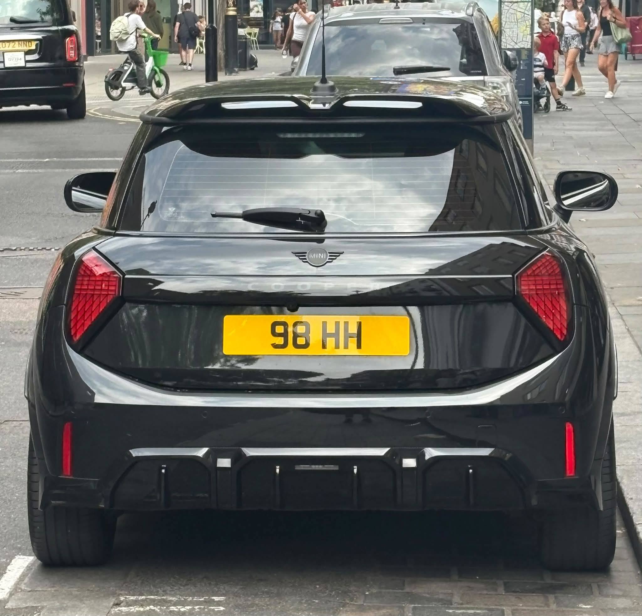 UK Number Plate 98 HH on a 2025 Black Mini Cooper Sport C Auto