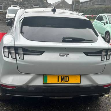 UK Number Plate 1 MD on a 2025 White Ford Mustang Mach-E Gt Awd