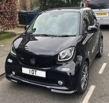 UK Number Plate 1 OT on a 2017 Black Smart Fortwo