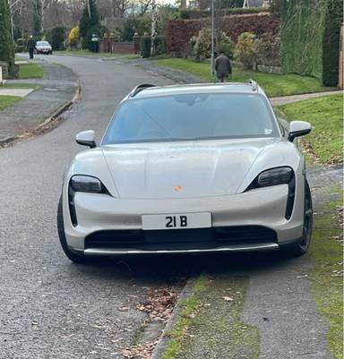 UK Number Plate 21 B on a 2022 Grey Porsche Taycan 4s Cross Turismo