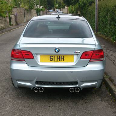 UK Number Plate 61 HH on a 2010 Black Porsche