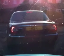 UK Number Plate 62 R on a 2010 Grey Jaguar