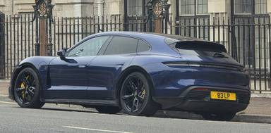 UK Number Plate 83 LP on a 2022 Blue Porsche