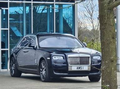 UK Number Plate AMS 1 on a 2016 Black Rolls Royce Ghost