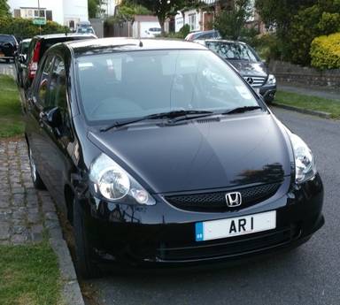 UK Number Plate AR 1 on a 2015 Black Honda
