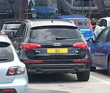 UK Number Plate B 2 on a 2025 Grey Porsche
