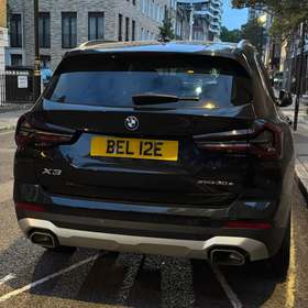 BEL 12E on a vehicle — Belize diplomatic registration