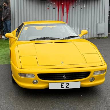 UK Number Plate E 2 on a 1998 Yellow Ferrari