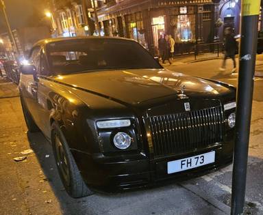UK Number Plate FH 73 on a 2008 Black Rolls Royce