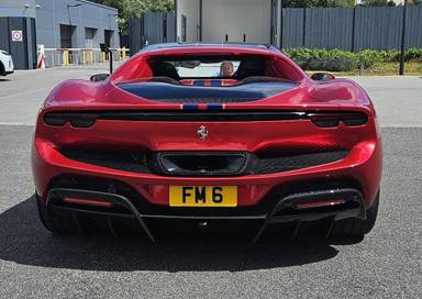 UK Number Plate FM 6 on a 2023 RED Ferrari 296 Gtb S-A