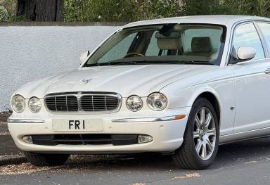 UK Number Plate FR 1 on a 2006 White Jaguar XJ