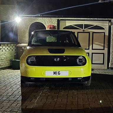 UK Number Plate M 16 on a 2022 Yellow Honda E Advance