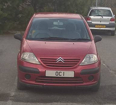 UK Number Plate OC 1 on a 2016 White KIA