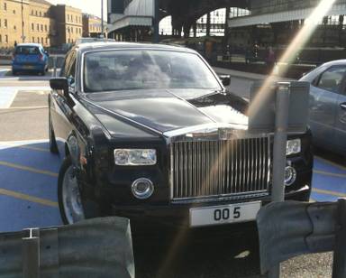UK Number Plate OO 5 on a 2008 Black Aston Martin
