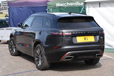 UK Number Plate R 1 on a 2025 Black Land Rover