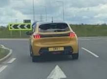 UK Number Plate SMX 1 on a 2023 Yellow Peugeot