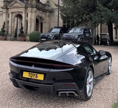 UK Number Plate TOY 5 on a 2025 Black Ferrari