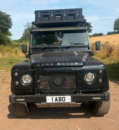 UK Number Plate 1 ABO on a 2007 Black Land Rover Defender
