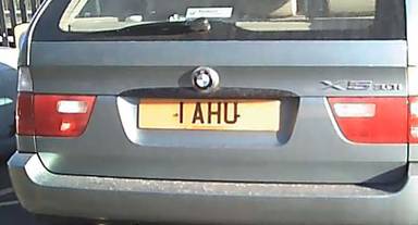 UK Number Plate 1 AHU on a 2001 Green BMW X5