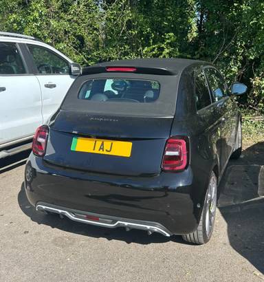 UK Number Plate 1 AJ on a 2023 Black Abarth A-Class
