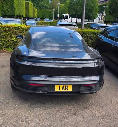 UK Number Plate 1 AR on a 2021 Black Porsche Taycan Turbo S