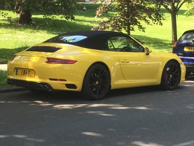UK Number Plate 1 BAT on a 2016 Yellow Porsche 911