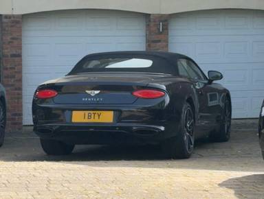 UK Number Plate 1 BTY on a 2019 Black Bentley Continental Gt