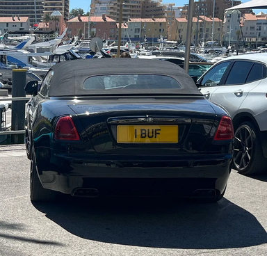 UK Number Plate 1 BUF on a 2017 Black Rolls Royce Dawn
