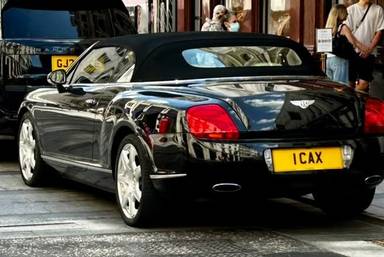 UK Number Plate 1 CAX on a 2008 Black Bentley Continental