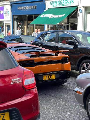UK Number Plate 1 CC on a 2016 Orange Lamborghini Huracan