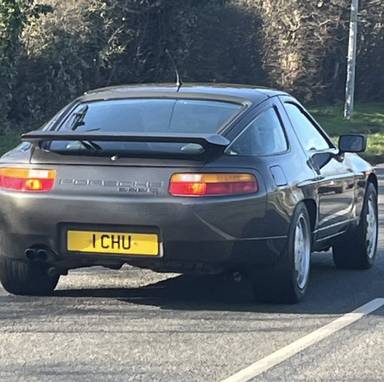 UK Number Plate 1 CHU on a 1990 Grey Porsche 928