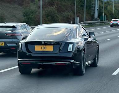 UK Number Plate 1 DC on a 2024 Black Rolls Royce Spectre Ev