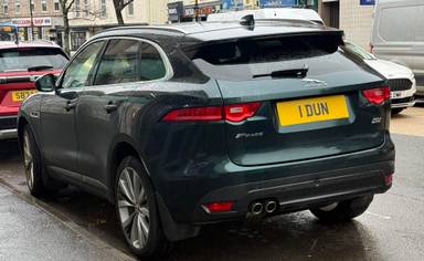 UK Number Plate 1 DUN on a 2018 Green Jaguar F-Pace