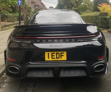 UK Number Plate 1 EDF on a 2026 Black Porsche 911 Turbo S Hev S-A