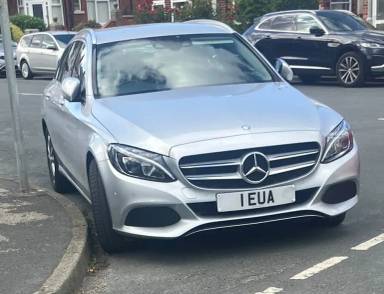 UK Number Plate 1 EUA on a 2015 Silver Mercedes-Benz C