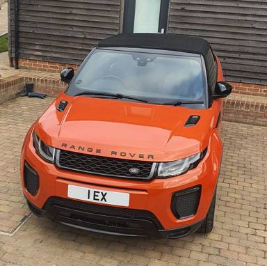 UK Number Plate 1 EX on a 2016 Orange Land Rover Range Rover Evoque