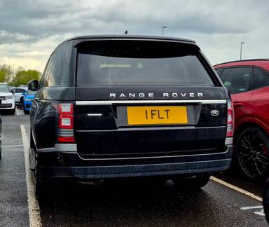 UK Number Plate 1 FLT on a 2015 Black Land Rover Range Rover
