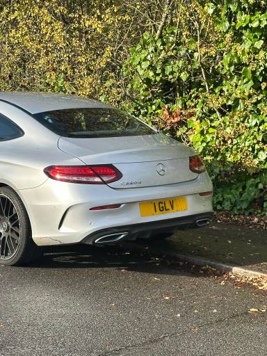 UK Number Plate 1 GLV on a 2000 Black Mercedes C