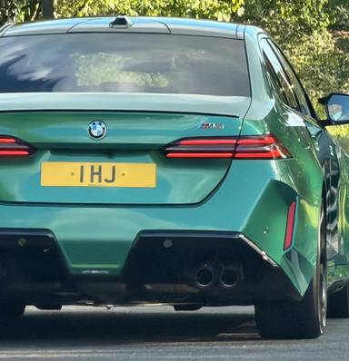 UK Number Plate 1 HJ on a 2026 Green BMW M5 Phev Auto