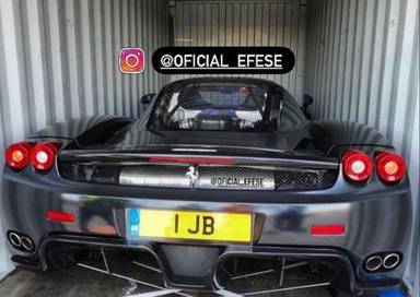 UK Number Plate 1 JB on a 2004 Black Ferrari Enzo