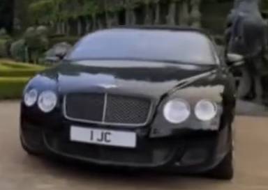 UK Number Plate 1 JC on a 2009 Black Bentley Continental