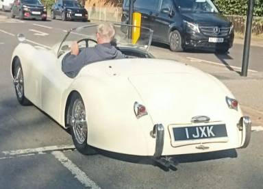 UK Number Plate 1 JXK on a 1954 White Jaguar XK