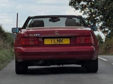 UK Number Plate 1 LNK on a 1996 RED Mercedes SL